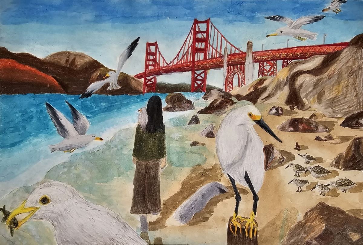 A person with long hair stands on a beach facing the Golden Gate Bridge. The beach is covered with white birds and one sits on her shoulder.