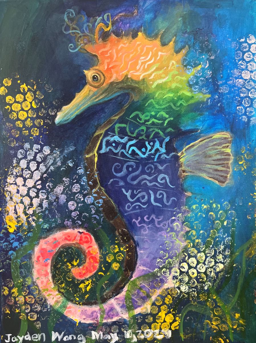 A multi-colored seahorse in profile.