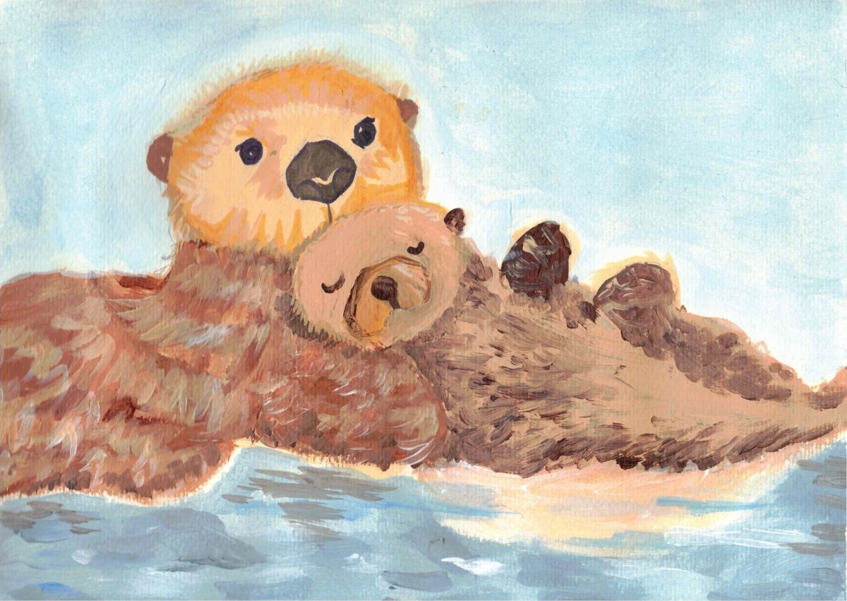 A female sea otter is seen holding a baby sea otter as it sleeps in her arms. They appear to be floating in water.