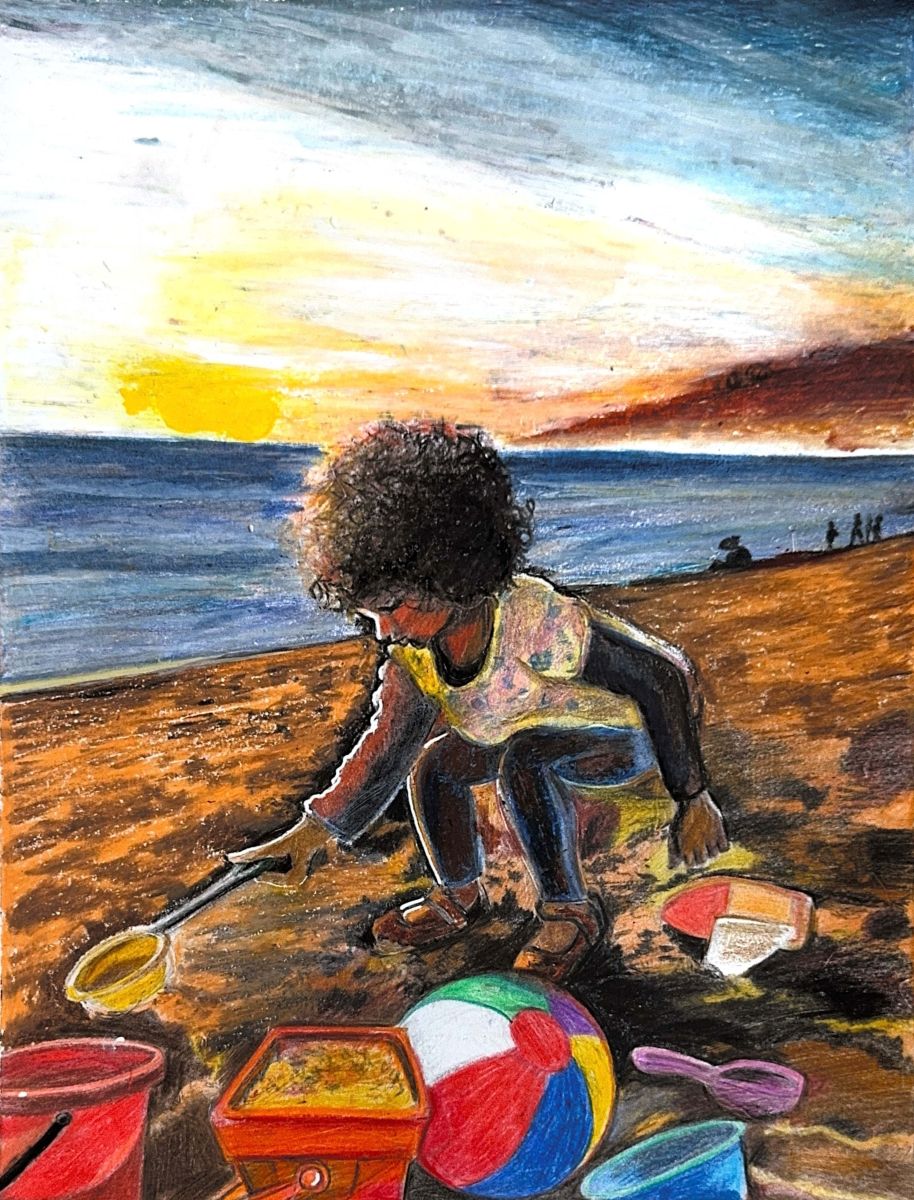 A young girl with dark curly hair crouches down on the beach with her small shovel. A beach ball, sand pails, and other toys surround her.
