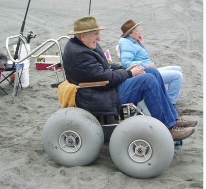 Man using a beach wheelchair