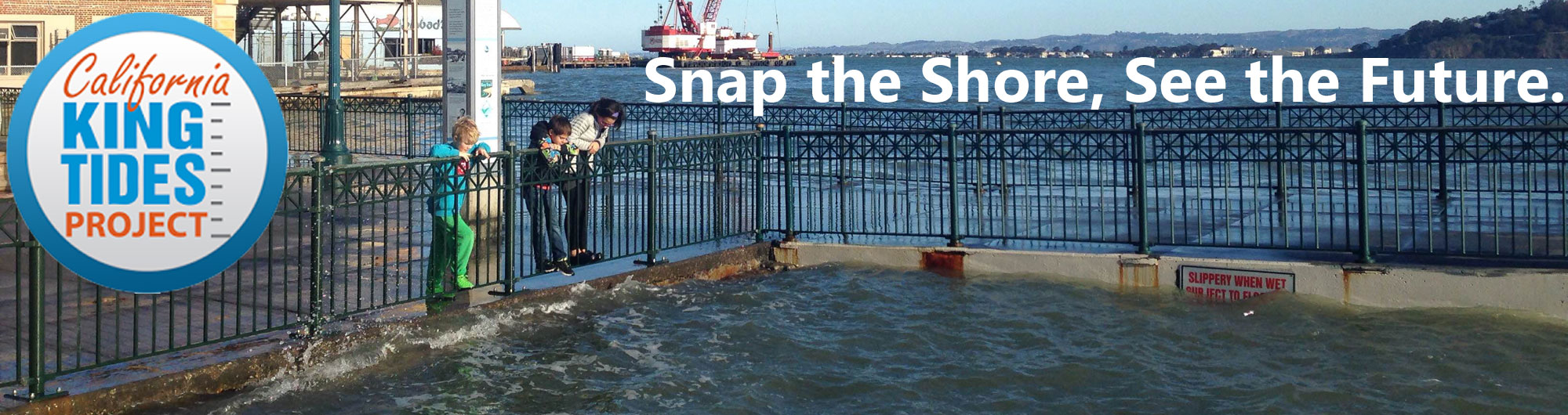 California King Tides Project. Snap the Shore, See the Future. A family watches the king tides at San Francisco's Pier 14