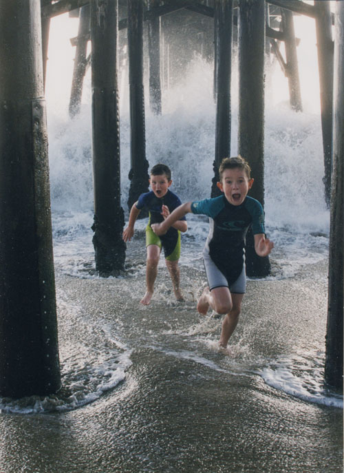"Pier Panic" at Seal Beach (kids running away from wave under the pier)