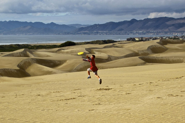 Frisbee in the Dunes, Oceano Dunes, by Randy Krauch
