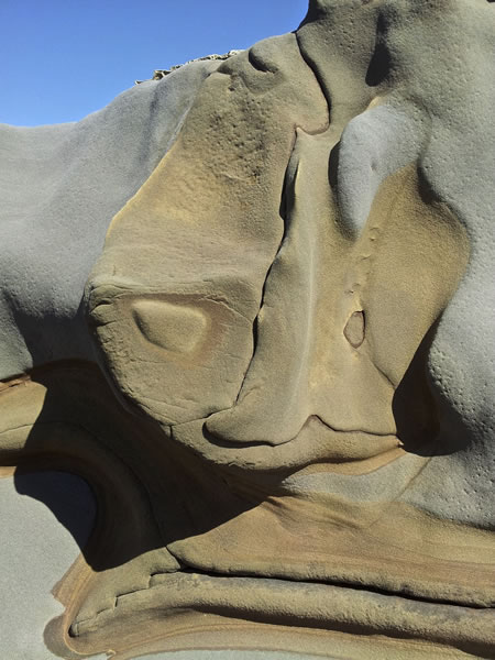 Rocks resembling Picasso faces, Santa Cruz, by Vivienne Orgel