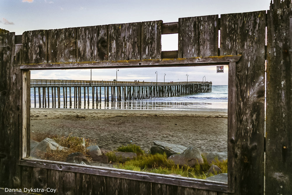 Photo of Cayucos Pier through window, by Danna Dykstra-Coy