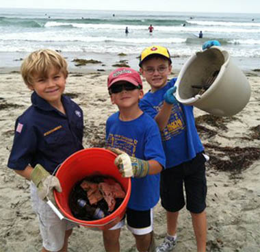 Three boys with their buckets