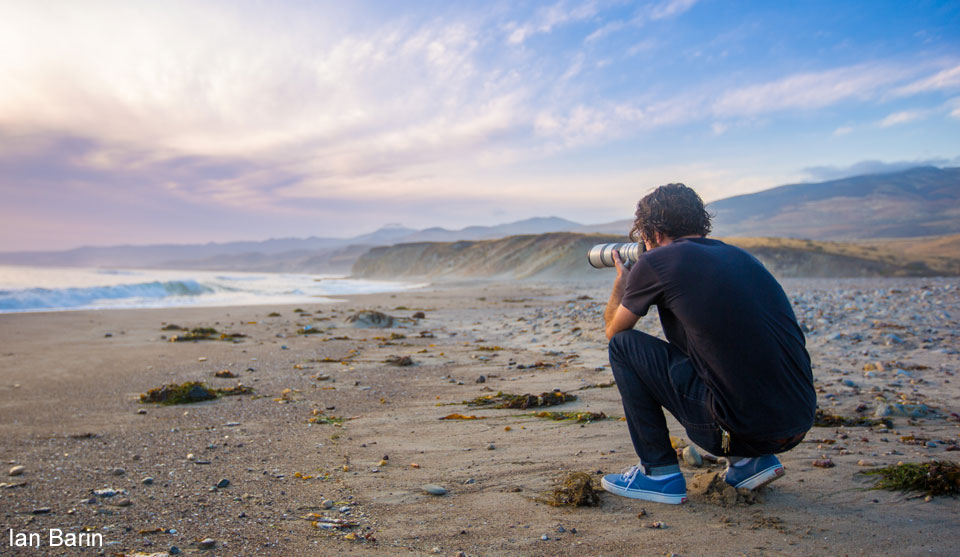 Photo by Ian Barin of a photographer on the beach