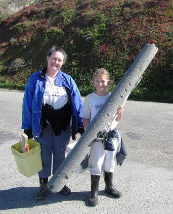 Volunteers with 6 foot foam pole found in Pacifica, San Mateo County